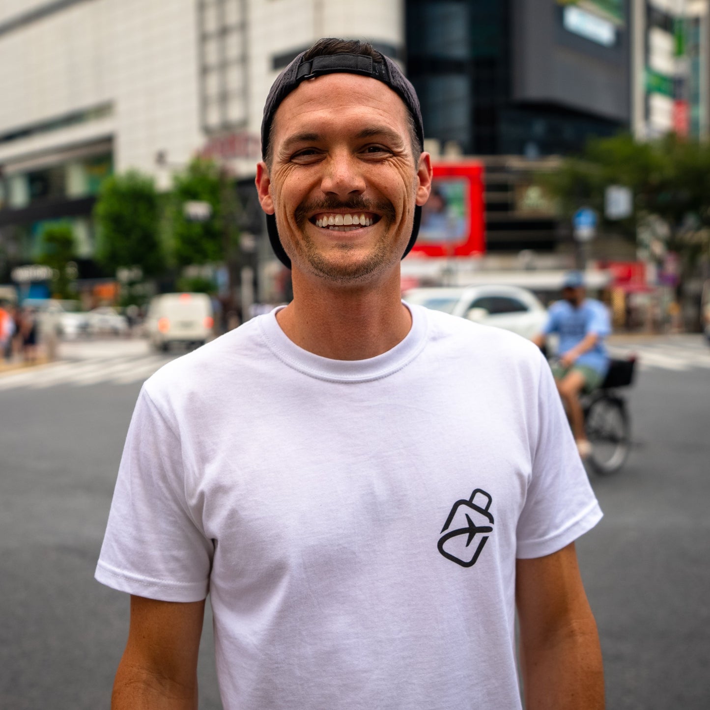 Nate wearing a white Airport Diagram T-Shirt